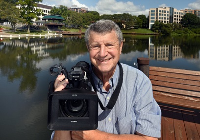 Image of Richard Krantz holding a camera